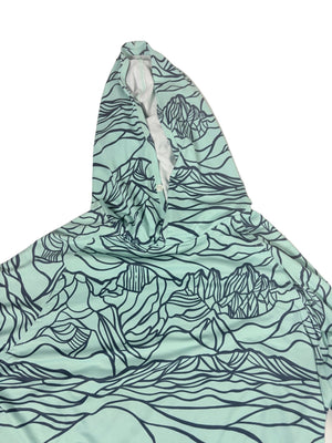 a mint green dri fit hoodie with mountains