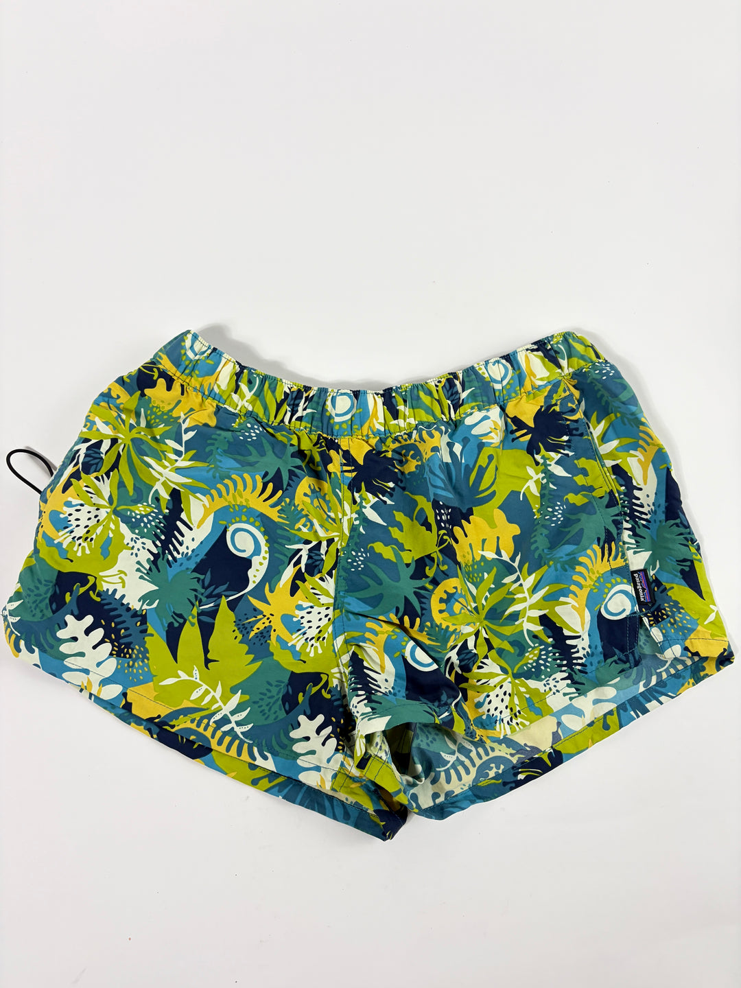 women's running shorts in blue and green pattern.