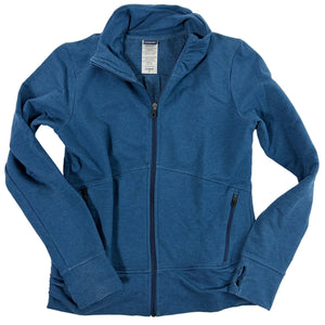 A heathered blue zip-up hoodie jacket laid flat on a light off-white background. The jacket features a high collar, a full-length front zipper, zippered hand pockets, and a white brand label inside the collar.